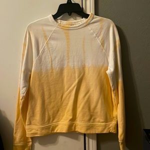 peach and white sweatshirt